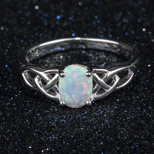 Vista 4 de Anillo de compromiso de boda de plata de ley 925 con nudo celta en forma de corazón de ópalo de fuego