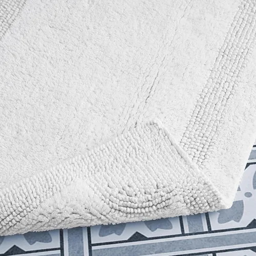 Vista 3 de Laura Ashley Juego de 2 alfombrillas de baño reversibles de algodón, color blanco