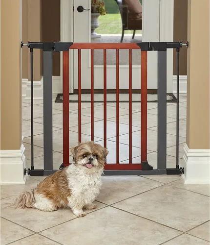 Vista 2 de MidWest Homes for Pets Puerta para mascotas de 29 pulgadas de alto con marco de grafito texturizado y puerta de madera decorativa, se expande a 38
