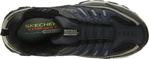 Vista 5 de Skechers Afterburn - Tenis deportivos de entrenamiento con espuma viscoelástica para hombre Strike On
