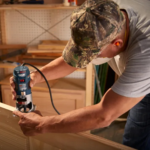 Vista 7 de BOSCH PR20EVS Colt 1.0 HP Variable-Speed Palm Router - 5.6 Amp Motor, Soft Start, Constant ResponsCircuitry, Ergonomic Grip, Rugged Aluminum Base