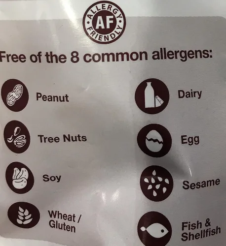 Vista 2 de MadeGood Granola Minis Club Pack (20 unidades, 0.85 onzas cada uno); 10 bolsas de chispas de chocolate y 10 bolsas de granola de bayas mixtas