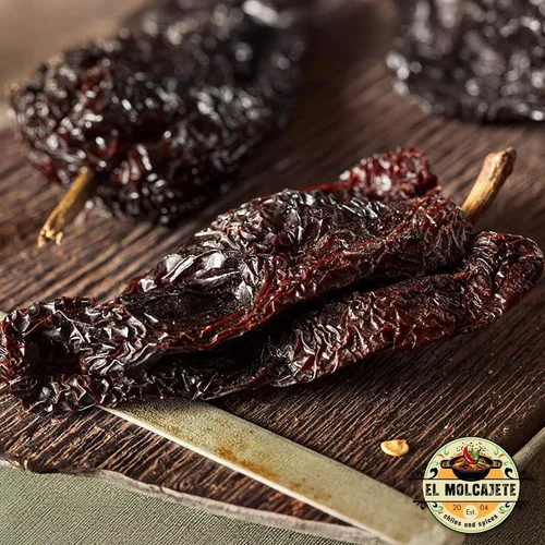 Vista 7 de Chile ancho seco mexicano el molcajete marca para recetas mexicanas, tamales, salsa, chile, carnes, sopas, estofados y barbacoa.