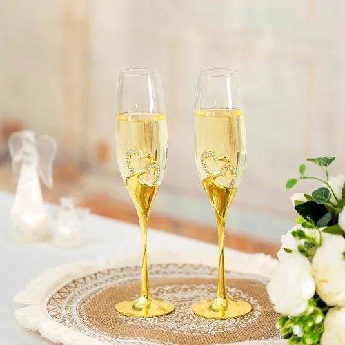 Vista 2 de Juego de copas de champán para boda, copas de flauta de tostado dorado, paquete de 2 con diamantes de imitación, decoración de corazones para bodas