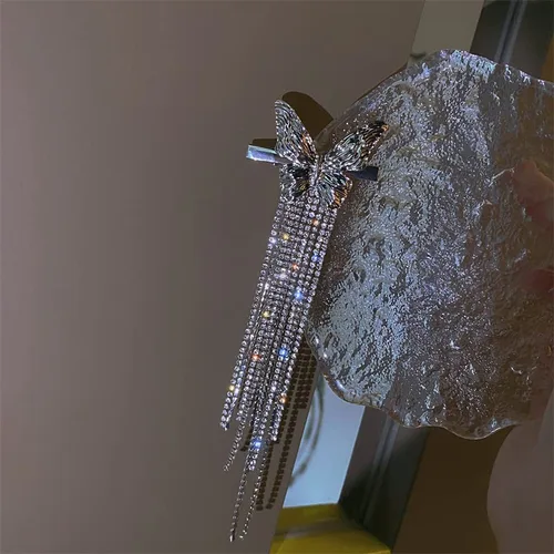 Vista 8 de Pinzas para el cabello de mariposa plateadas con diamantes de imitación, diseño de moda, accesorios para el cabello, cadena larga de borla