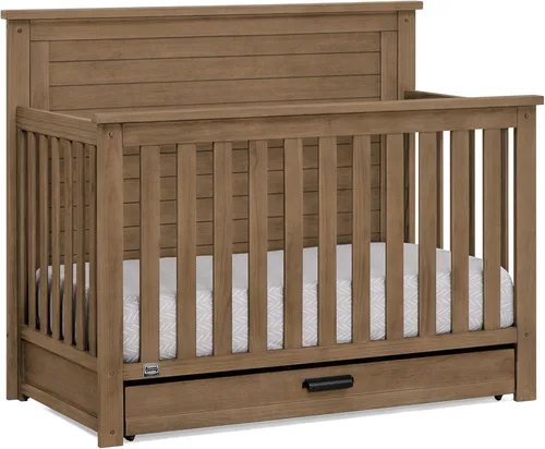 Delta Children Simmons Kids Caden cuna convertible 6 en 1 con cajón de gaveta, certificada Greenguard Gold, roble envejecido